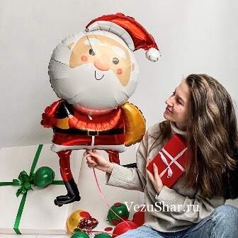 Фигура Санта с подарком фото
